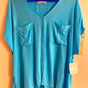 Brand new beautiful blue blouse with pockets. 89th Madison brand. Large